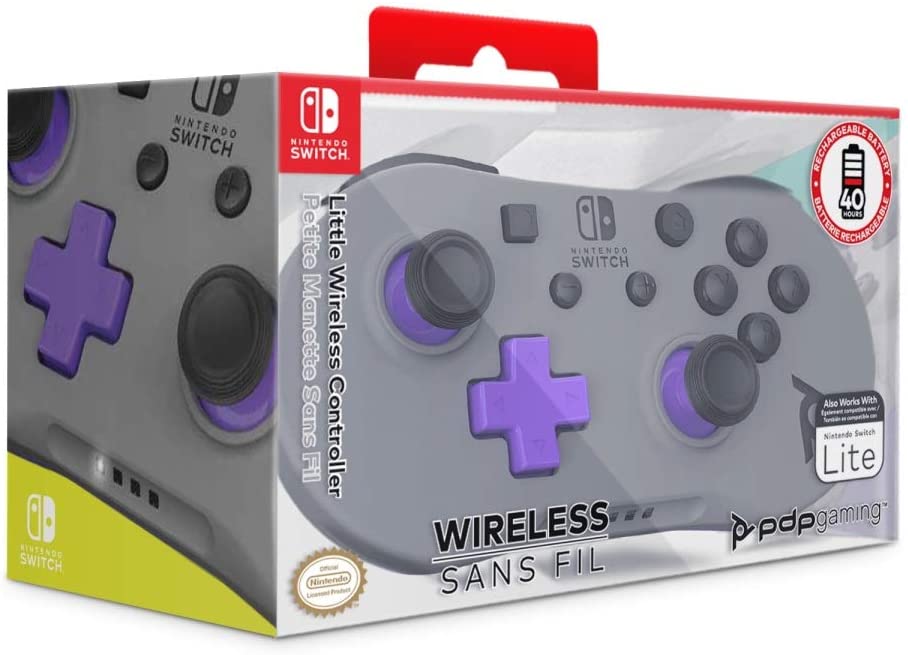 Console Nintendo Switch Lite gris divers accessoires testés à main